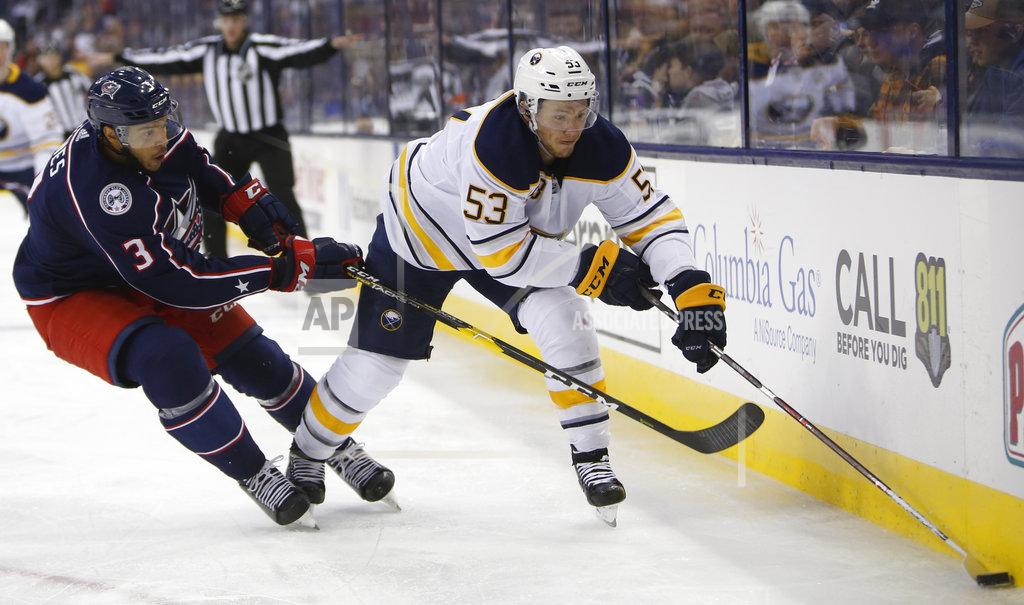 Jay Laprete Buffalo Sabres' Jeff Skinner, right, controls the puck as Columbus Blue Jackets' Seth Jones defends during the third period of an NHL hockey game Saturday, Oct. 27, 2018, in Columbus, Ohio. (AP Photo/Jay LaPrete)