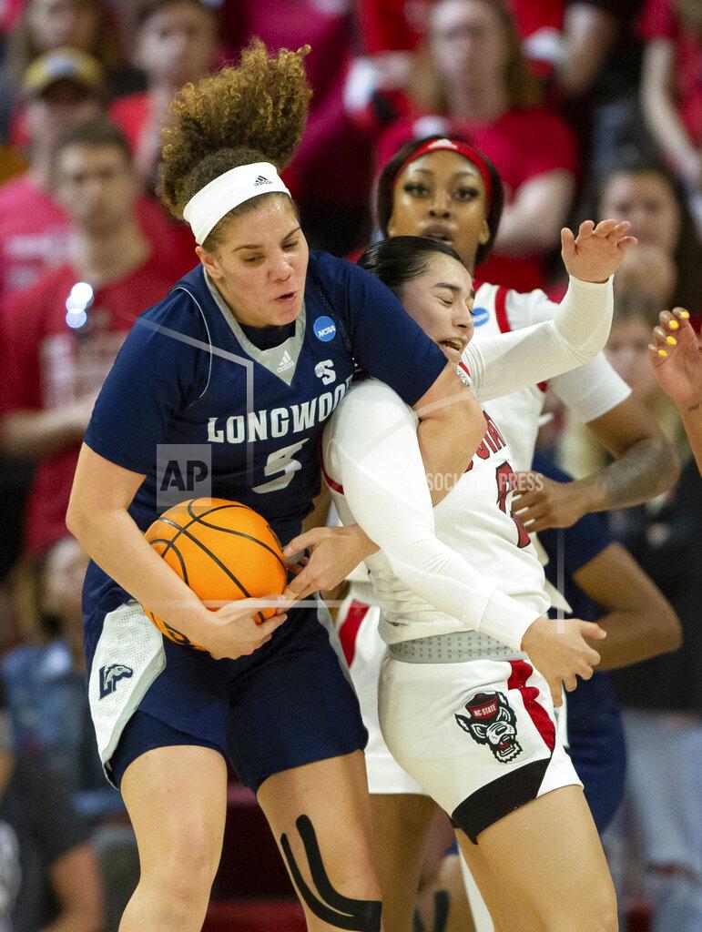 Ben Mckeown Longwood's Adriana Shipp, left, grabs a rebound over North Carolina State's Raina Perez, right, during the second half of a college basketball game in the first round of the NCAA tournament in Raleigh, N.C., Saturday, March 19, 2022. (AP Photo/Ben McKeown)
