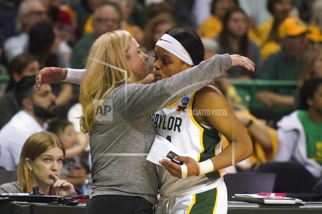 Lm Otero Baylor guard Sarah Andrews, right, gets a hug from head coach Nicki Collen after Andrews fouled out in the final minutes of the second half of a college basketball game against South Dakota in the second round of the NCAA tournament in Waco, Texas, Sunday, March 20, 2022. (AP Photo/LM Otero)