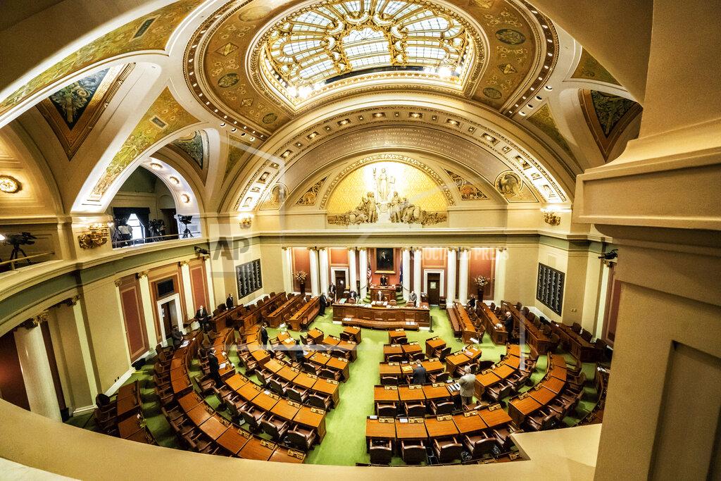 Glen Stubbe Democratic House Speaker Melissa Hortman, of Brooklyn Park calls for members to stand in silence and bow their heads for 8 Minutes and 46 seconds in honor of George Floyd Friday, June 12, 2020, as the Minnesota State Legislature met in a special session. (Glen Stubbe/Star Tribune via AP)