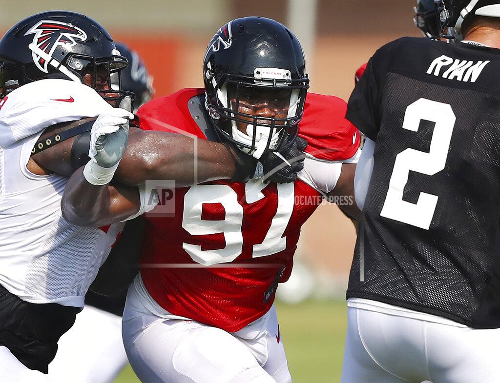 Compton@Ajc.com Atlanta Falcons defensive tackle Grady Jarrett (97) pressures quarterback Matt Ryan while rushing against guard James Carpenter, left, during an NFL football team practice in Flowery Branch, Ga., Monday, July 29, 2019. (Curtis Compton/Atlanta Journal-Constitution via AP)