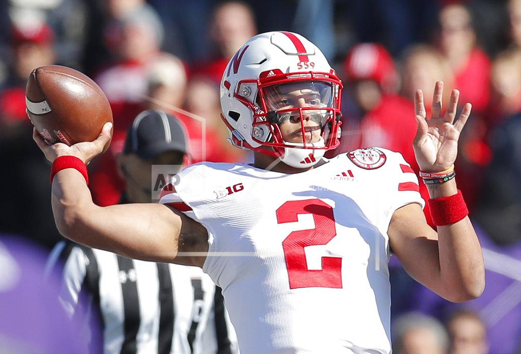 Jim Young Nebraska's Adrian Martinez throws a pass against Northwestern during the first half of an NCAA college football game Saturday, Oct. 13, 2018, in Evanston, Ill. (AP Photo/Jim Young)