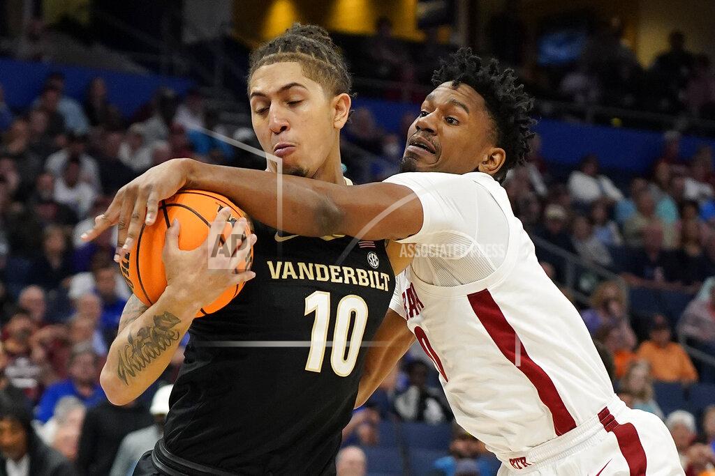 Chris O'meara Vanderbilt forward Myles Stute (10) is fouled by Alabama forward Noah Gurley (0) during the first half of an NCAA men's college basketball Southeastern Conference tournament game Thursday, March 10, 2022, in Tampa, Fla. (AP Photo/Chris O'Meara)