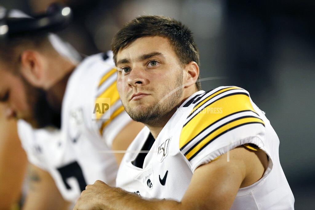 Charlie Neibergall FILE - In this Sept. 14, 2019, file photo, Iowa place kicker Keith Duncan sits on the bench during the second half of an NCAA college football game against Iowa State, in Ames, Iowa. Duncan was a freshman hero _ only to lose his job for two full seasons. He's re-emerged as a key cog for the 14th-ranked Hawkeyes in 2019. (AP Photo/Charlie Neibergall, File)