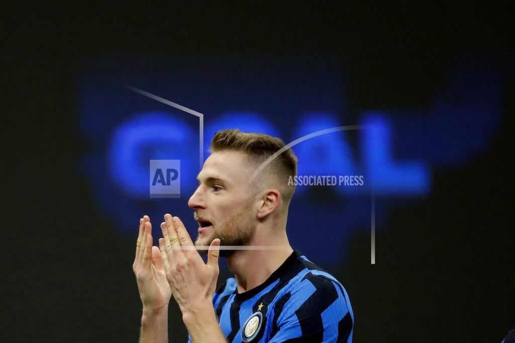 Inter Milan's Milan Skriniar celebrates his goal against Atalanta during a Serie A soccer match between Inter Milan and Atalanta at the San Siro stadium in Milan, Italy, Monday, March 8, 2021. (AP Photo/Luca Bruno)