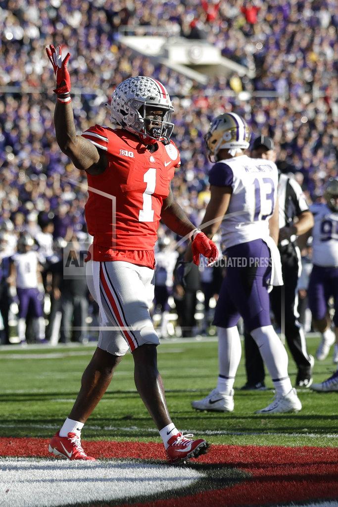 Marcio Jose Sanchez Ohio State wide receiver Johnnie Dixon (1) celebrates after scoring against Washington during the first half of the Rose Bowl NCAA college football game Tuesday, Jan. 1, 2019, in Pasadena, Calif. (AP Photo/Marcio Jose Sanchez)