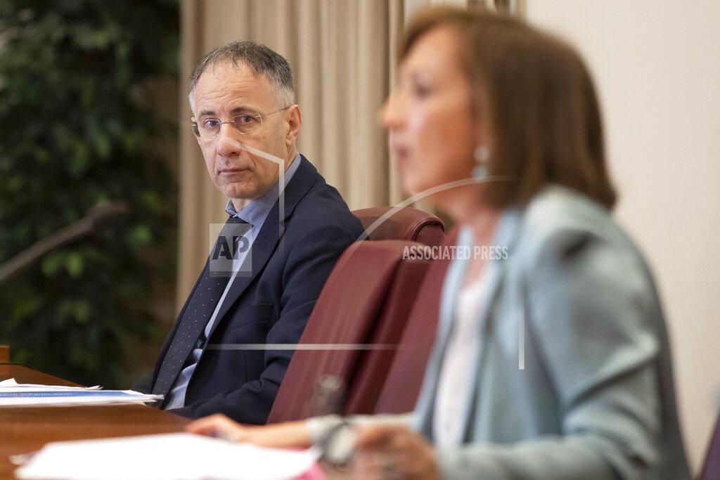 Alessandra Tarantino General Manager of the Gaslini children's hospital in Genoa, Paolo Petralia, left, listens to Sandra Zampa, Health Ministry Undersecretary, during a press conference at the Italian Health Ministry to present the results of an investigation on the psychological and behavioral impact the coronavirus lockdown has had on children and adolescents in Italy, in Rome, Tuesday, June 16, 2020. (AP Photo/Alessandra Tarantino)