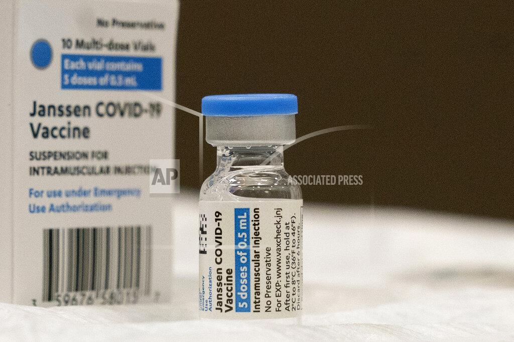 Mark Lennihan FILE - In this March 3, 2021, file photo, a vial of the Johnson & Johnson COVID-19 vaccine is displayed at South Shore University Hospital in Bay Shore, N.Y. With the U.S. pause of the vaccine, authorities are weighing whether to resume the shots the way European regulators decided to -- with warnings of a “very rare” risk. New guidance is expected late Friday, April 23, after a government advisory panel deliberates a link between the shot and a handful of vaccine recipients who developed highly unusual blood clots. (AP Photo/Mark Lennihan, File)