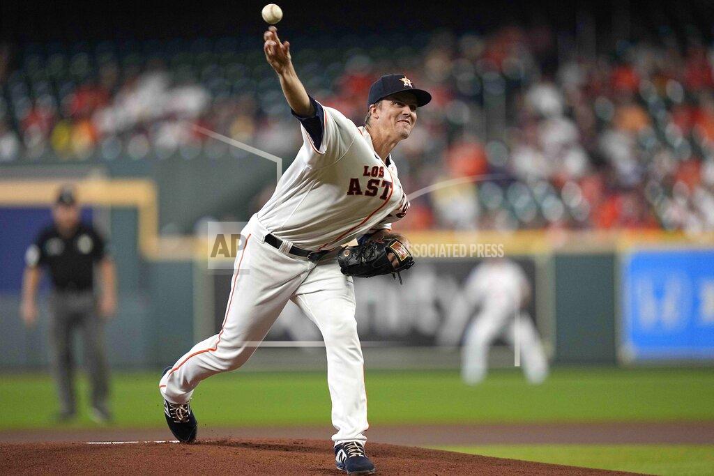 David J. Phillip Houston Astros starting pitcher Zack Greinke throws against the Arizona Diamondbacks during the first inning of a baseball game Sunday, Sept. 19, 2021, in Houston. (AP Photo/David J. Phillip)