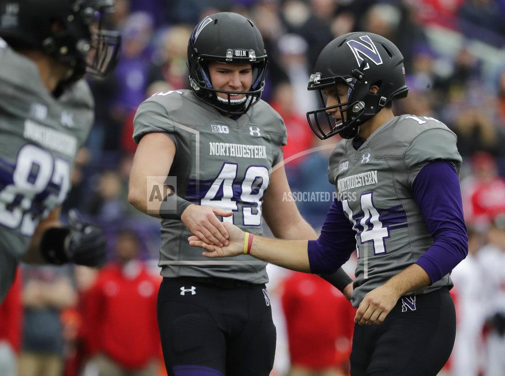 Nam Y. Huh Northwestern kicker Charlie Kuhbander, right, celebrates with punter Jake Collins after scoring a field goal against Wisconsin during the second half of an NCAA college football game in Evanston, Ill., Saturday, Oct. 27, 2018. (AP Photo/Nam Y. Huh)