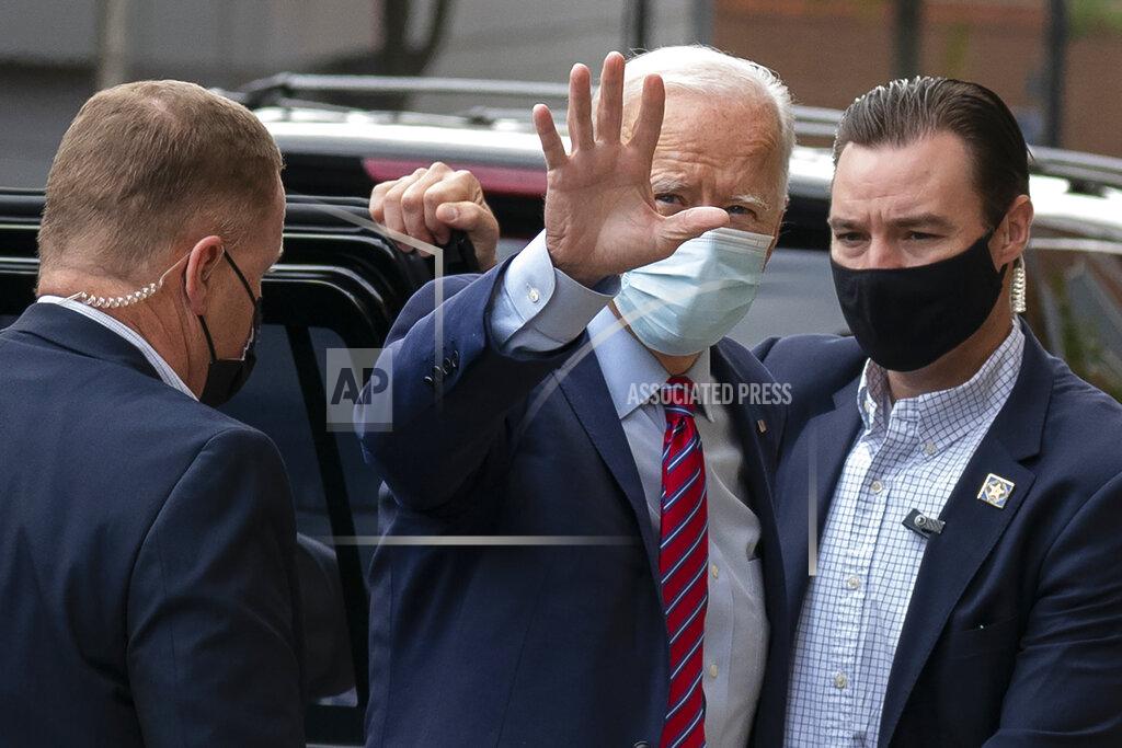 Carolyn Kaster Democratic presidential candidate former Vice President Joe Biden waves as he arrives at The Queen theatre in Wilmington, Del., Monday, Oct. 19, 2020. (AP Photo/Carolyn Kaster)