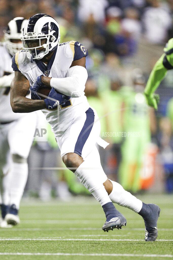 Margaret Bowles Los Angeles Rams tight end Gerald Everett (81) gains yardage after catching the ball in an NFL game against the Seattle Seahawks, Thursday, Oct. 3, 2019, in Seattle. The Seahawks defeated the Rams 30-29. (Margaret Bowles via AP)