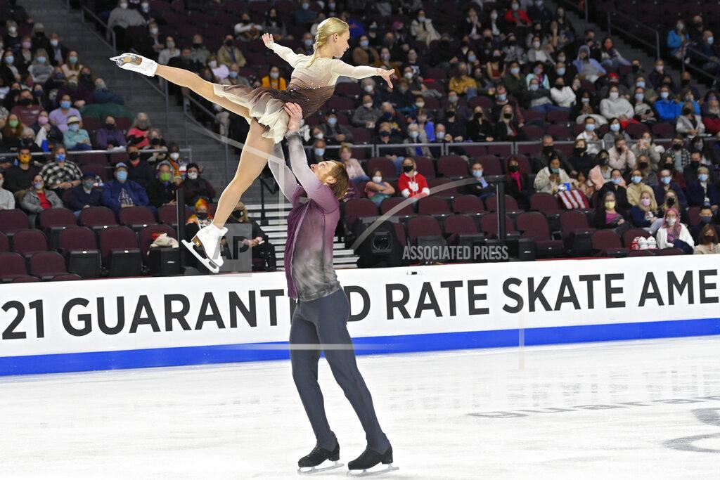 David Becker Evgenia Tarasova and Vladimir Morozov, of Russia, perform during the pairs short program at the Skate America figure skating event Friday, Oct. 22, 2021, in Las Vegas. (AP Photo/David Becker)