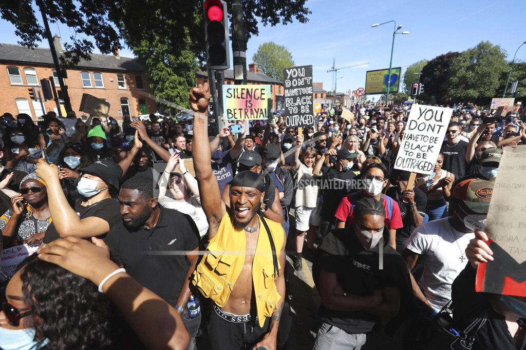 Niall Carson People protest under the slogan Black Lives Matter rally outside the US Embassy in Dublin, Ireland, Monday June 1, 2020, following the death of George Floyd in Minneapolis, USA. The recent killing of George Floyd in Minneapolis, USA, has led to protests in many countries, and across the U.S. (Niall Carson/PA via AP)