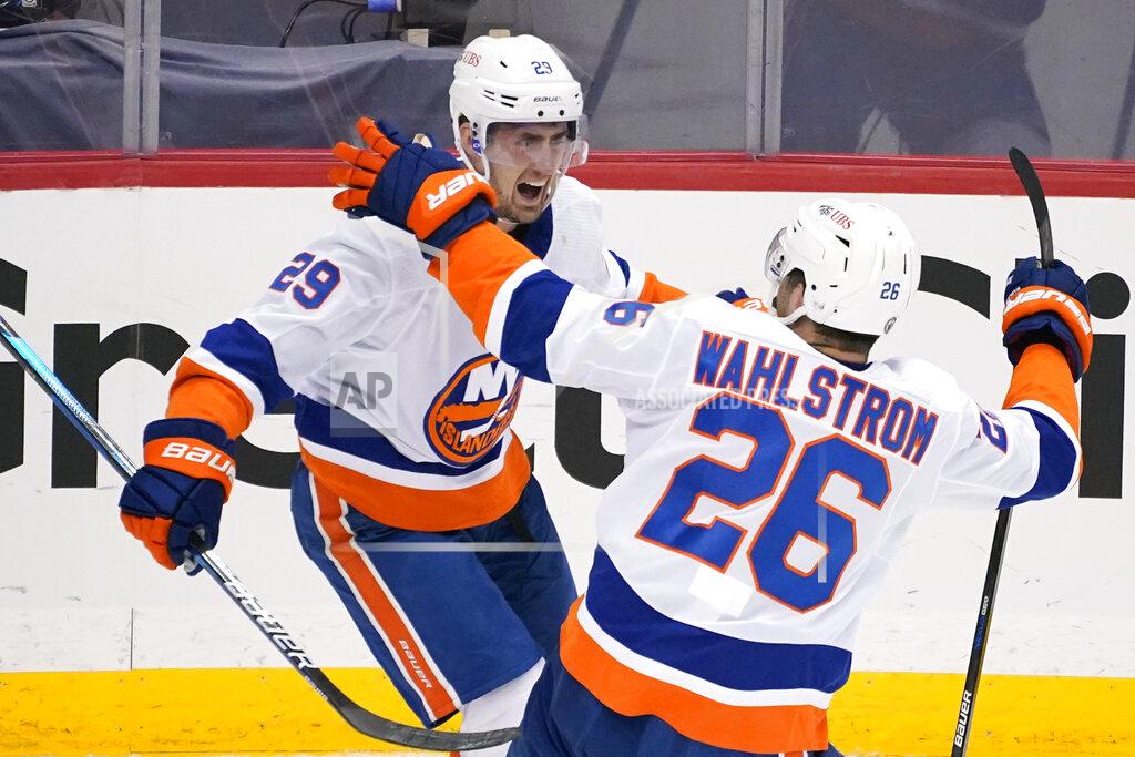 Gene J. Puskar New York Islanders' Brock Nelson (29) celebrates after scoring during the third period in Game 1 of an NHL hockey Stanley Cup first-round playoff series against the Pittsburgh Penguins in Pittsburgh, Sunday, May 16, 2021. The Islander won in overtime 4-3. (AP Photo/Gene J. Puskar)