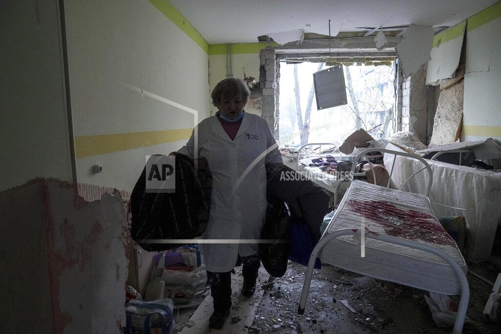 Evgeniy Maloletka FILE - A medical worker walks through the damaged maternity hospital in Mariupol, Ukraine, Wednesday, March 9, 2022. A Russian attack has severely damaged the hospital in the besieged port city of Mariupol, Ukrainian officials say. (AP Photo/Evgeniy Maloletka, File)