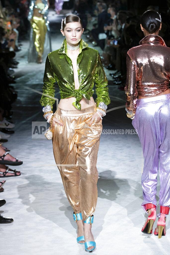 Eduardo Munoz Alvarez Model Gigi Hadid walks the runway at the Tom Ford spring/summer 2022 fashion show at Lincoln Center during New York Fashion Week on Sunday, Sept. 12, 2021. (AP Photo/Eduardo Munoz Alvarez)
