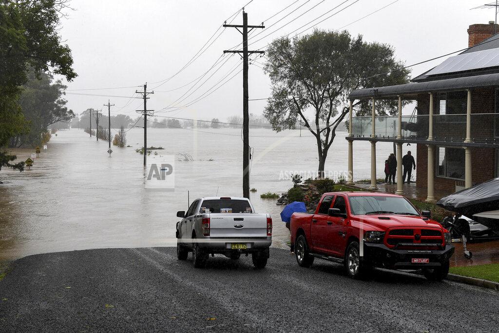 Bianca De Marchi Residential properties and roads are submerged under floodwater from the swollen Hawkesbury River in Windsor, northwest of Sydney, Australia Monday, July 4, 2022. (Bianca De Marchi/AAP Image via AP)