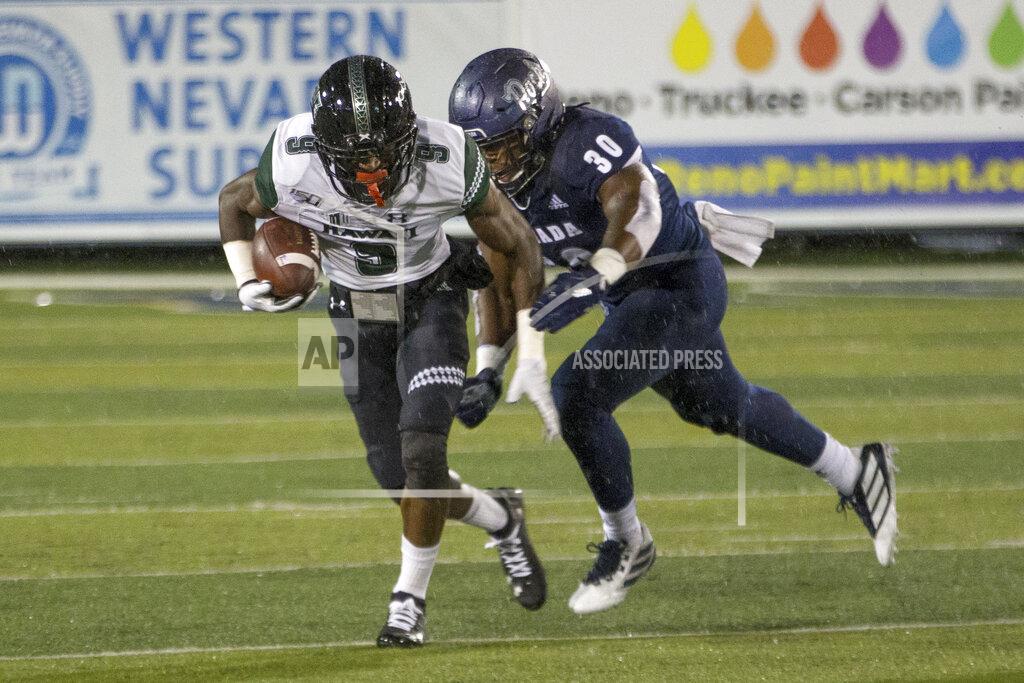 Tom R. Smedes Hawaii receiver JoJo Ward (9) is chased by Nevada's Lawson Hall (30) in the first half of an NCAA college football game in Reno, Nev. Saturday, Sept. 28, 2019. (AP Photo/Tom R. Smedes)