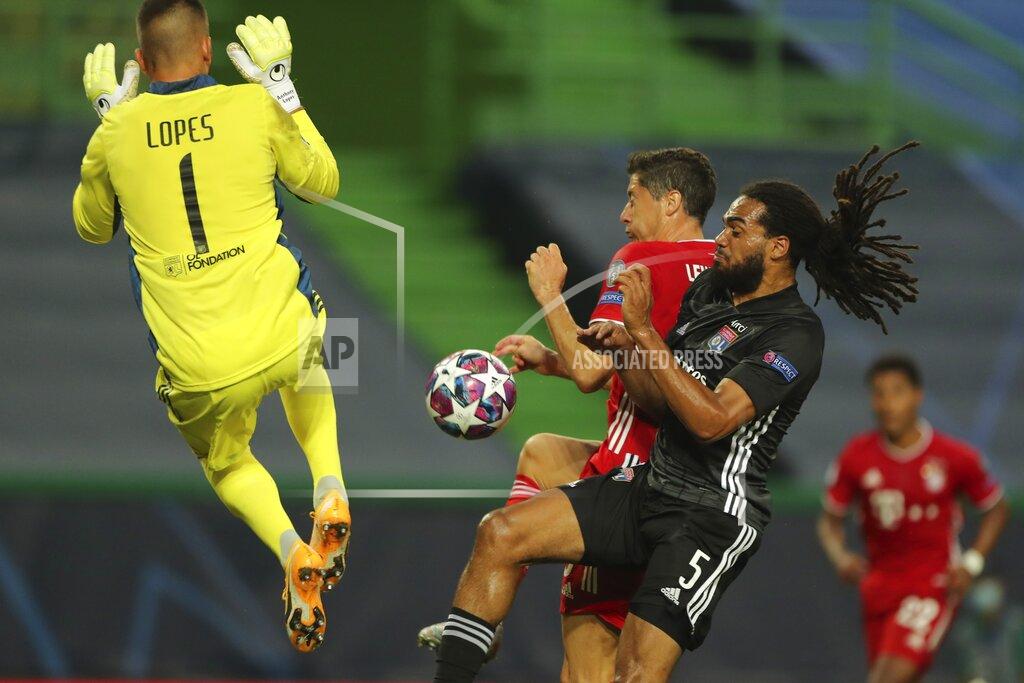 Miguel A. Lopes Lyon's Lucas Tousart, right, and Lyon's goalkeeper Anthony Lopes try to stop Bayern's Robert Lewandowski during the Champions League semifinal soccer match between Lyon and Bayern Munich at the Jose Alvalade stadium in Lisbon, Portugal, Wednesday, Aug. 19, 2020. (Miguel A. Lopes/Pool via AP)