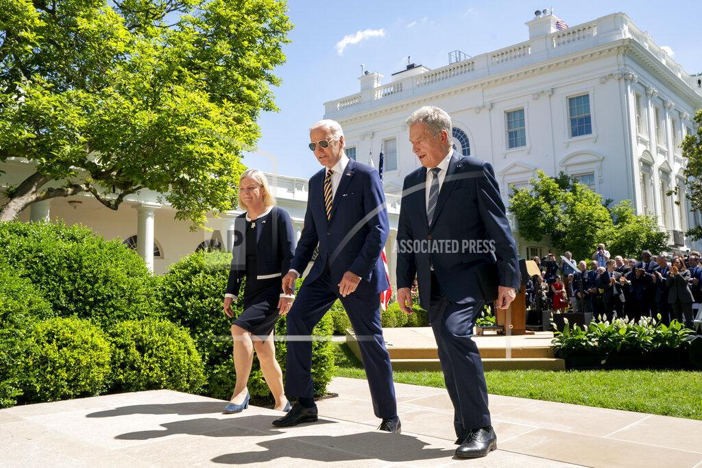 Andrew Harnik President Joe Biden departs with Swedish Prime Minister Magdalena Andersson, left, and Finnish President Sauli Niinisto, right, after speaking in the Rose Garden at the White House in Washington, Thursday, May 19, 2022. (AP Photo/Andrew Harnik)