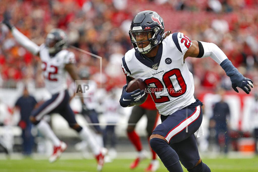 Mark Lomoglio Houston Texans strong safety Justin Reid (20) runs after intercepting a pass by Tampa Bay Buccaneers quarterback Jameis Winston during the first half of an NFL football game Saturday, Dec. 21, 2019, in Tampa, Fla. (AP Photo/Mark LoMoglio)