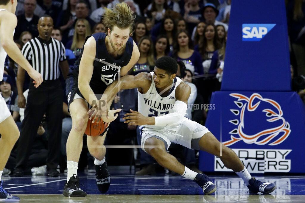 Matt Slocum Villanova's Jermaine Samuels, right, battles with Butler's Nate Fowler for a loose ball during the first half of an NCAA college basketball game, Saturday, March 2, 2019, in Philadelphia. (AP Photo/Matt Slocum)
