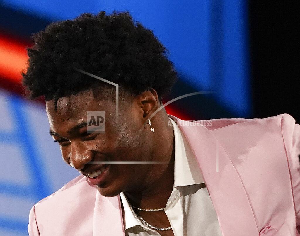 Corey Sipkin Kai Jones reacts after being selected as the 19th overall selection by the New York Knicks during the NBA basketball draft, Thursday, July 29, 2021, in New York. (AP Photo/Corey Sipkin)