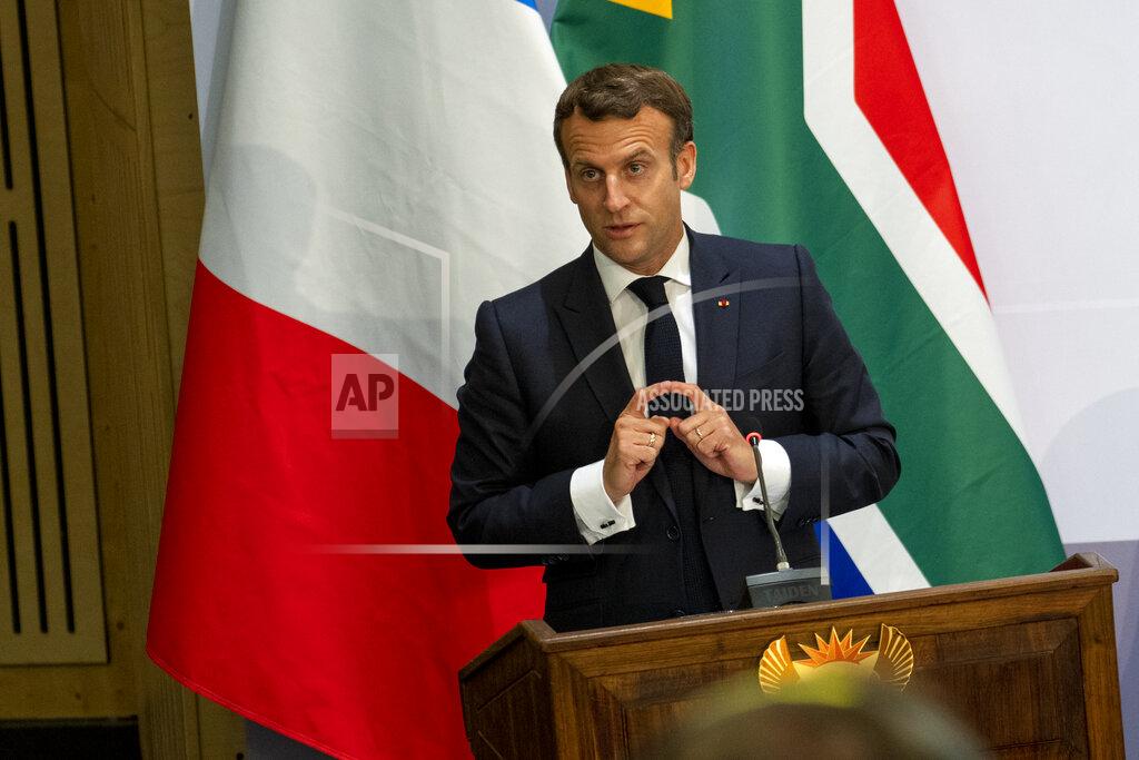 Jerome Delay French President Emmanuel Macron delivers a speech at the University of Pretoria Future Africa in Pretoria, South Africa, Friday May 28, 2021. Macron and South African President Cyril Ramaphosa are launching a program to support African vaccine production, a project backed by the European Union, the United States and the World Bank. (AP Photo/Jerome Delay)