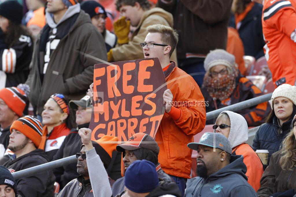 Ron Schwane A fan holds up a sign in support of Cleveland Browns defensive end Myles Garrett during the first half of an NFL football game against the Miami Dolphins, Sunday, Nov. 24, 2019, in Cleveland. (AP Photo/Ron Schwane)