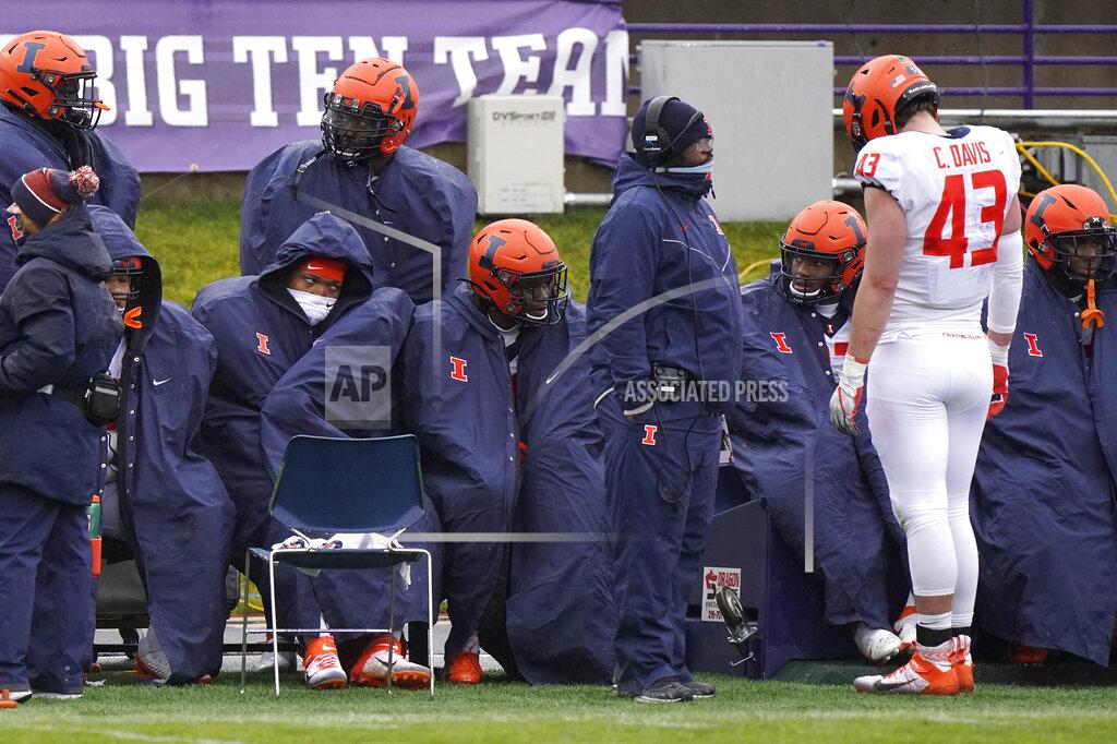 Nam Y. Huh Illinois players react as they sit on the bench during the second half of an NCAA college football game against Northwestern in Evanston, Ill., Saturday, Dec. 12, 2020. Northwestern won 28-10. (AP Photo/Nam Y. Huh)