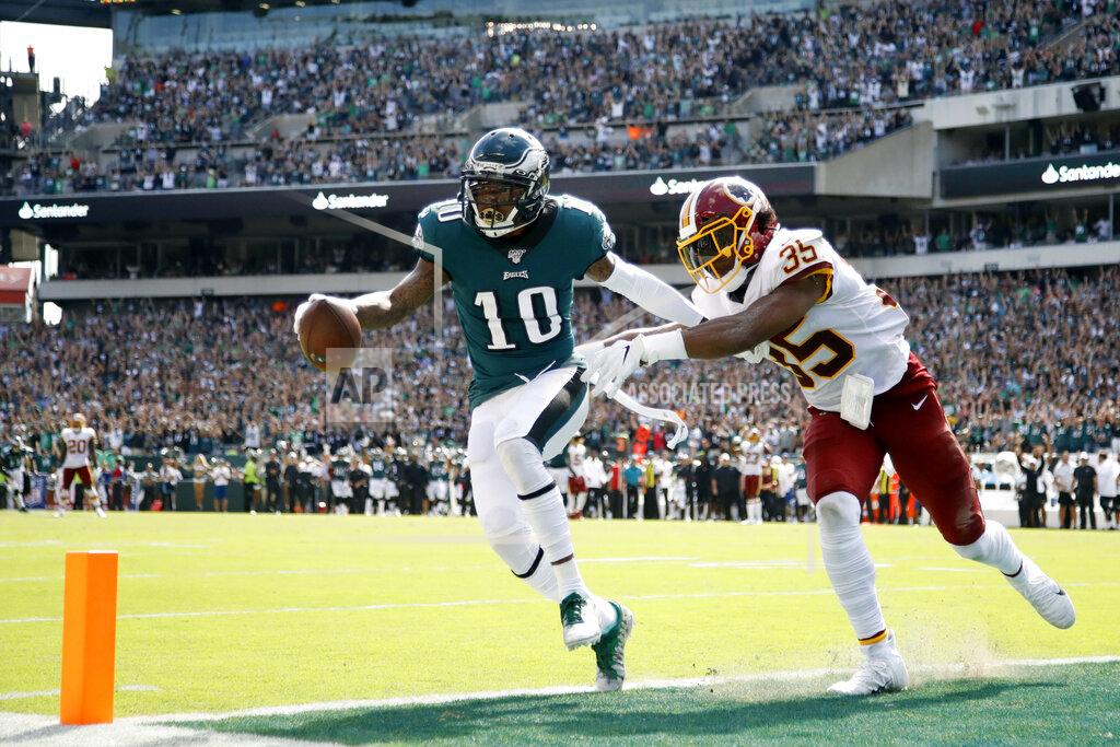 Matt Rourke FILE - In this Sunday, Sept. 8, 2019, file photo, Philadelphia Eagles' DeSean Jackson, left, scores a touchdown against Washington Redskins' Montae Nicholson during the second half of an NFL football game in Philadelphia. Jackson’s return to Philly couldn’t have gone much better. He made eight receptions for 154 yards and a pair of 50-plus-yard TD catches in sparking the Eagles’ rally from a 17-0 hole against the Redskins. (AP Photo/Matt Rourke, File)