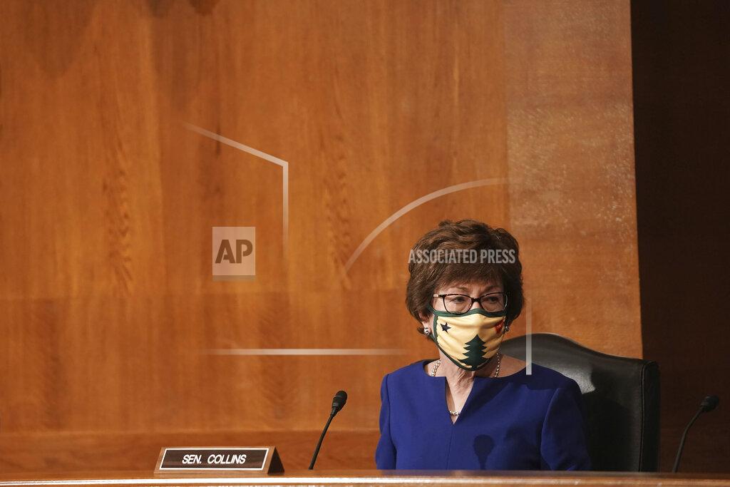 Greg Nash Sen. Susan Collins, R-Maine, listens to Surgeon General Jerome Adams give an opening statement during a Senate Health, Education, Labor and Pensions Committee hearing to discuss vaccines and protecting public health during the coronavirus pandemic on Capitol Hill, Wednesday, Sept. 9, 2020, in Washington. (Greg Nash/Pool via AP)