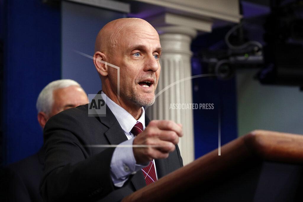 FILE - In this April 24, 2020 file photo, Stephen Hahn, commissioner of the U.S. Food and Drug Administration, speaks about the coronavirus in the James Brady Press Briefing Room of the White House in Washington. A group of physicians has asked a federal court to suspend a U.S. Food and Drug Administration rule that requires patients to visit a hospital, clinic or medical office to get an abortion pill. The American Civil Liberties Union filed a federal lawsuit Wednesday, May 27 in Maryland on behalf of the American College of Obstetricians and Gynecologists. (AP Photo/Alex Brandon, File)