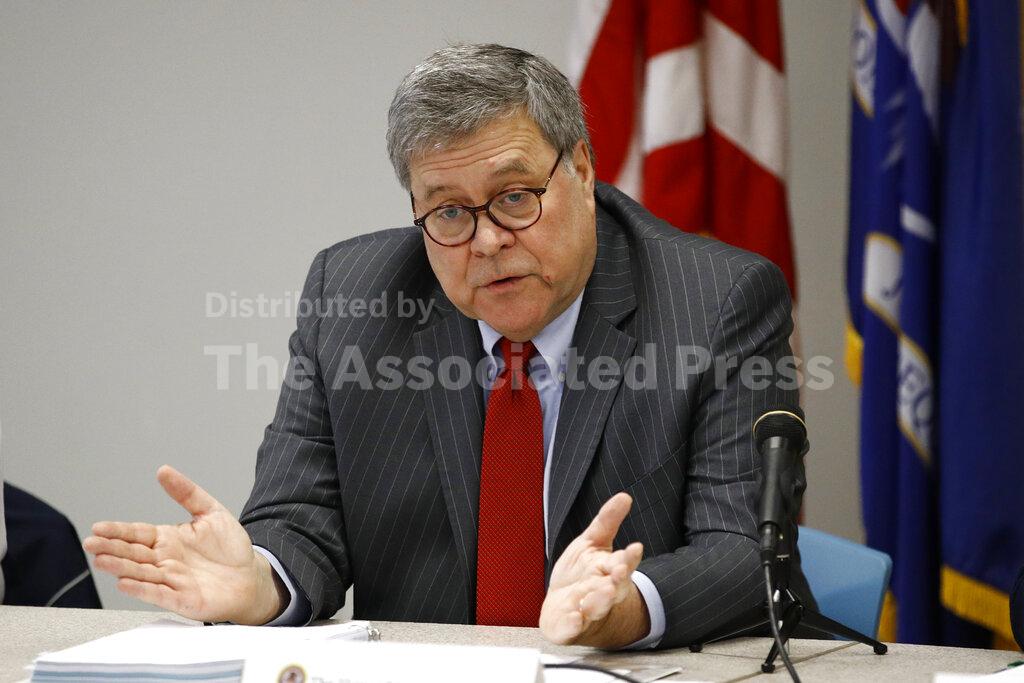 Attorney General William Barr speaks at a roundtable with members of local, state and federal law enforcement agencies at the Cleveland Police Department's Third District station, Thursday, Nov. 21, 2019, in Cleveland. (AP Photo/Patrick Semansky)