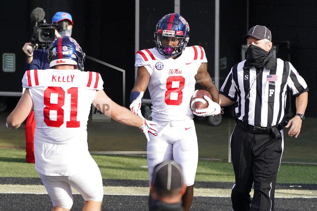 Mark Humphrey Mississippi wide receiver Elijah Moore (8) is congratulated by Casey Kelly (81) after Moore scored a touchdown against Vanderbilt in the second half of an NFL football game Saturday, Oct. 31, 2020, in Nashville, Tenn. The Steelers won 27-24. (AP Photo/Mark Humphrey)