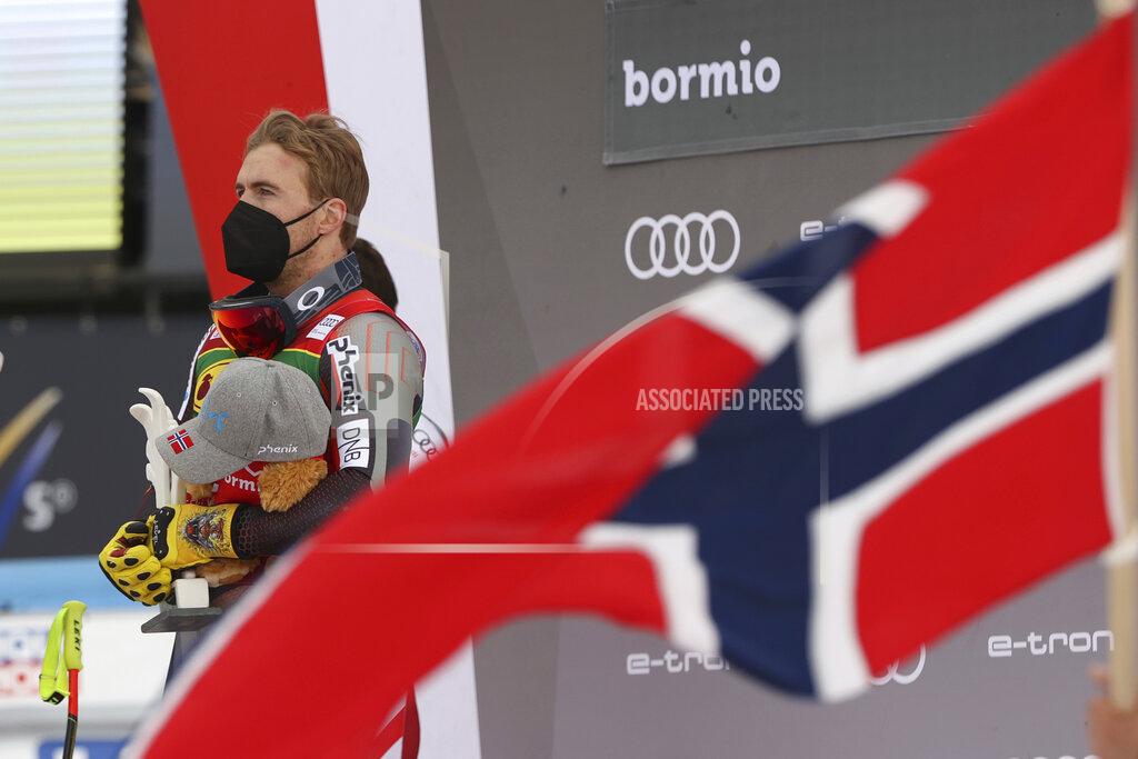 Luciano Bisi Norway's Aleksander Aamodt Kilde celebrates on the podium after winning an alpine ski men's World Cup super-G, in Bormio, Italy, Wednesday, Dec. 29, 2021. (AP Photo/Luciano Bisi)