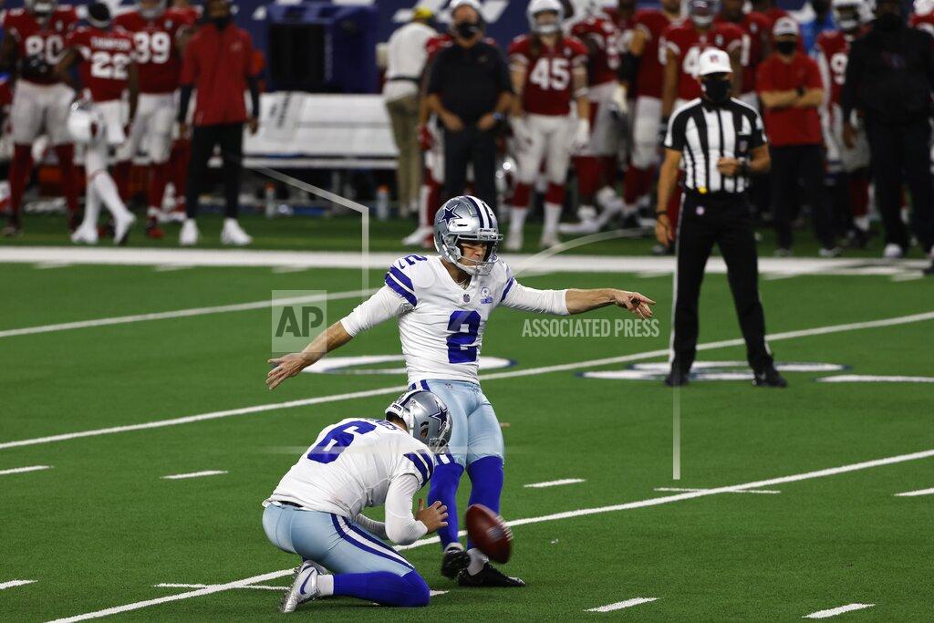 Ron Jenkins Dallas Cowboys' Chris Jones (6) holds as place kicker Greg Zuerlein (2) kicks a field goal in the first half of an NFL football game against the Arizona Cardinals in Arlington, Texas, Monday, Oct. 19, 2020. (AP Photo/Ron Jenkins)