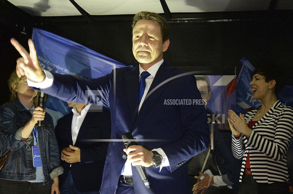 Czarek Sokolowski FILE - In this Wednesday, June 17, 2020 file photo, Mayor of Warsaw and candidate for Poland's president of main opposition party Civic Platform and Civic Coalition's Rafal Trzaskowski waves to supporters after the presidential debate at Polish Television headquarters held for the upcoming elections, in Warsaw, Polands current President Andrzej Duda is the frontrunner ahead of the election on Sunday, June 28, but polls show him unlikely to achieve the majority needed to win outright. That will require a runoff two weeks later in which he is expected to face off against Warsaw Mayor Rafal Trzaskowski in a very close race. (AP Photo/Czarek Sokolowski)