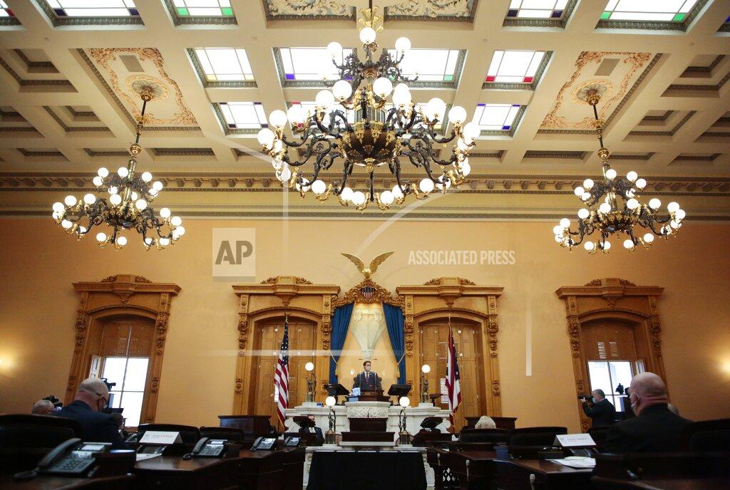 FILE - In this Dec. 14, 2020 file photo, Ohio Secretary of State Frank LaRose, center, calls to order the 55th Electoral College at the Ohio Statehouse in Columbus, Ohio. Ohio on Thursday, Feb.25, 2021, became the first state to challenge the U.S. Census Bureau's decision to push back the release of 2020 census figures so more time can be spent on fixing any inaccuracies in the data. (Joshua A. Bickel/The Columbus Dispatch via AP)
