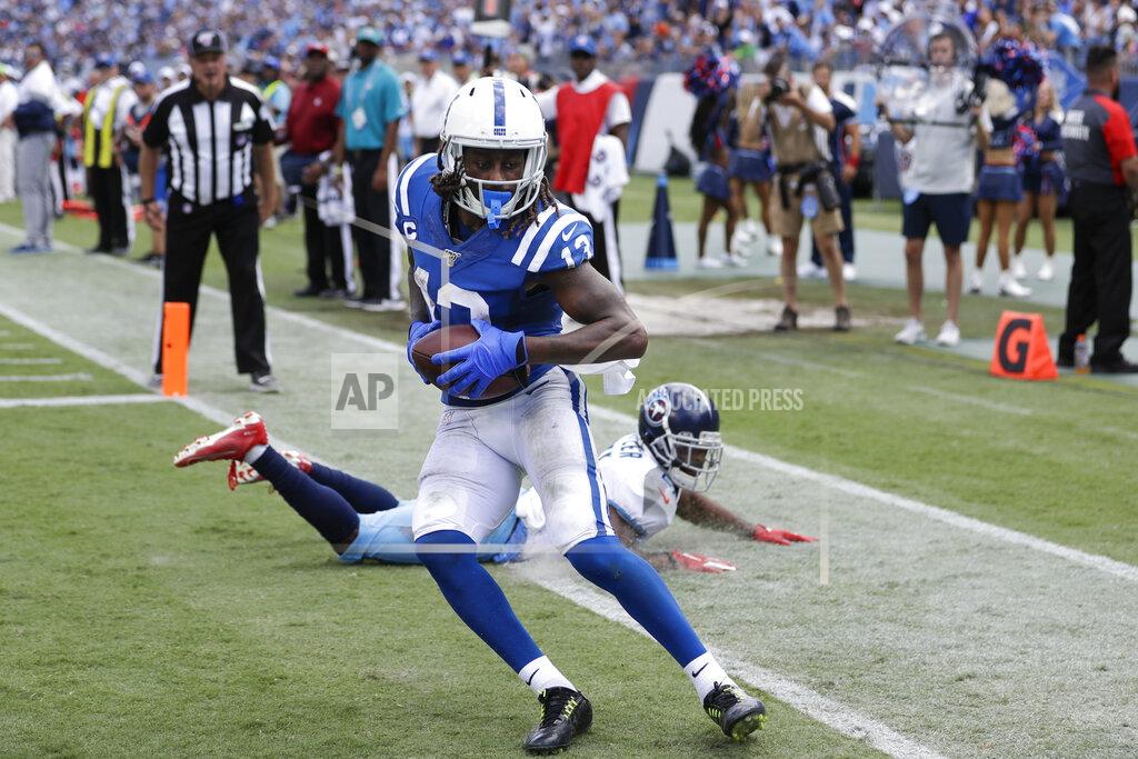 James Kenney Indianapolis Colts wide receiver T.Y. Hilton (13) catches a touchdown pass as he is defended by Tennessee Titans cornerback Malcolm Butler in the second half of an NFL football game Sunday, Sept. 15, 2019, in Nashville, Tenn. (AP Photo/James Kenney)