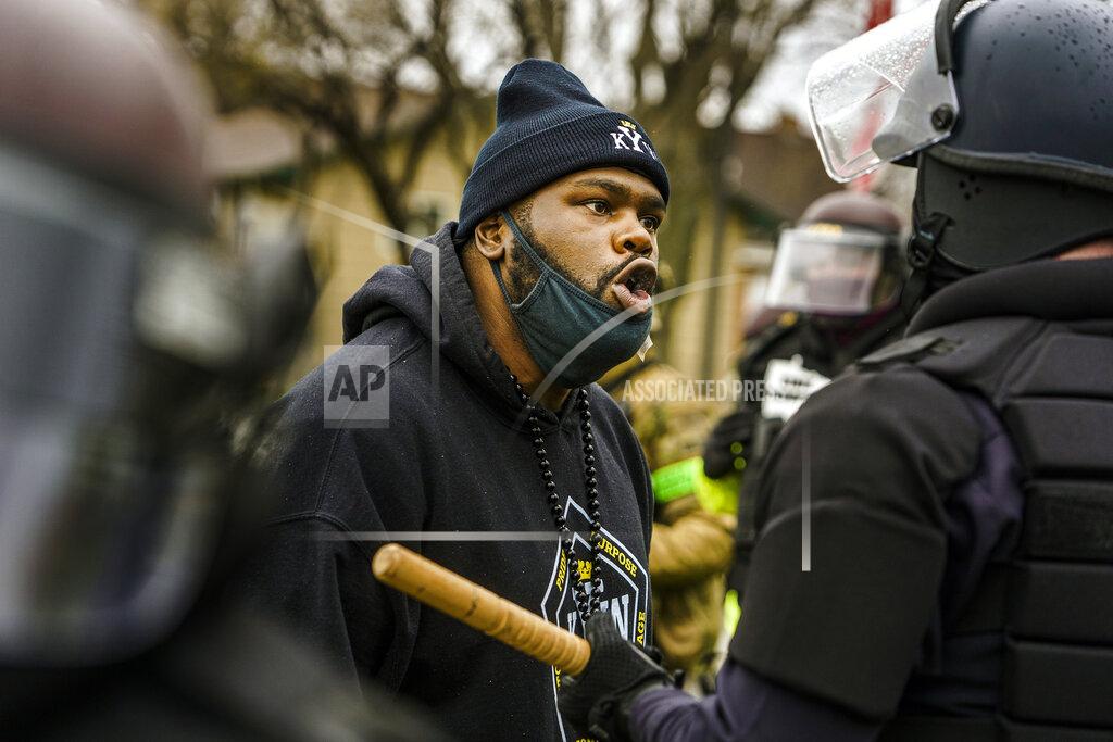 Richard Tsong-Taatarii Protesters confronted police over the shooting death of Daunte Wright at a rally at the Brooklyn Center Police Department in Brooklyn Center, Minn., Monday, April 12, 20121. (Richard Tsong-Taatarii/Star Tribune via AP)