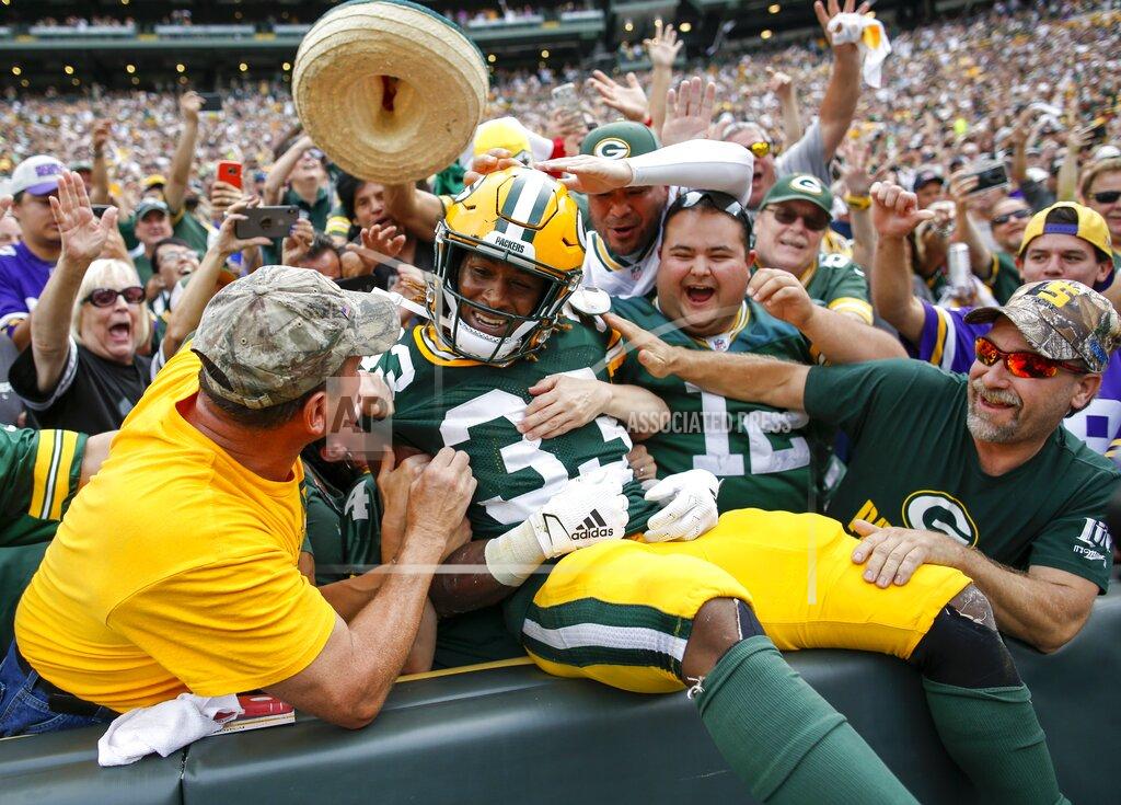 Matt Ludtke Green Bay Packers' Aaron Jones celebrates his touchdown run during the first half of an NFL football game against the Minnesota Vikings Sunday, Sept. 15, 2019, in Green Bay, Wis. (AP Photo/Matt Ludtke)
