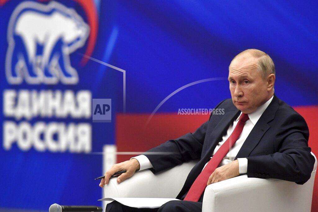 Mikhail Voskresensky FILE - In this Aug. 22, 2021, file photo, Russian President Vladimir Putin attends a meeting with members of the United Russia party with the sign of the party in the background in Moscow, Russia. Russia is holding three days of voting for a new parliament, or State Duma, that is unlikely to change the country’s political complexion. There’s no expectation that United Russia, the party devoted to Putin, will lose its dominance. (Mikhail Voskresensky/Sputnik, Kremlin/Pool Photo via AP, File)