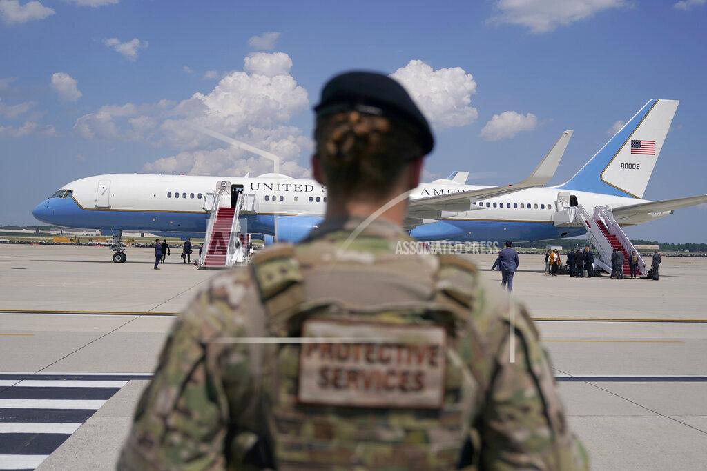 Jacquelyn Martin FILE - In this June 6, 2021, file photo a soldier stands guard near Air Force Two at Andrews Air Force Base, Md. About a third of the female service members in the Air Force and Space Force say they've experienced sexual harassment and many can describe accounts of sexism and a negative stigma associated with pregnancy and maternity leave, a study released Thursday, Sept. 9, has found. The review, done by the Air Force Inspector General, also concluded that minorities and females are underrepresented in leadership and officer positions, particularly at the senior levels, and get promoted less frequently. (AP Photo/Jacquelyn Martin, File)
