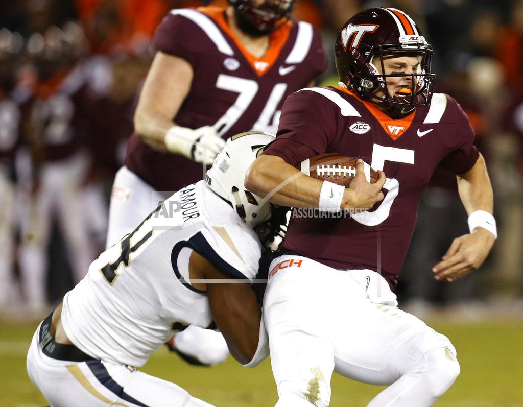 Steve Helber Virginia Tech quarterback Ryan Willis (5) is sacked by Georgia Tech defensive lineman Anree Saint-Amour (94) during the second half of an NCAA college football game in Blacksburg, Va., Thursday, Oct. 25, 2018. Georgia Tech defeated Virginia Tech 49-28. (AP Photo/Steve Helber)