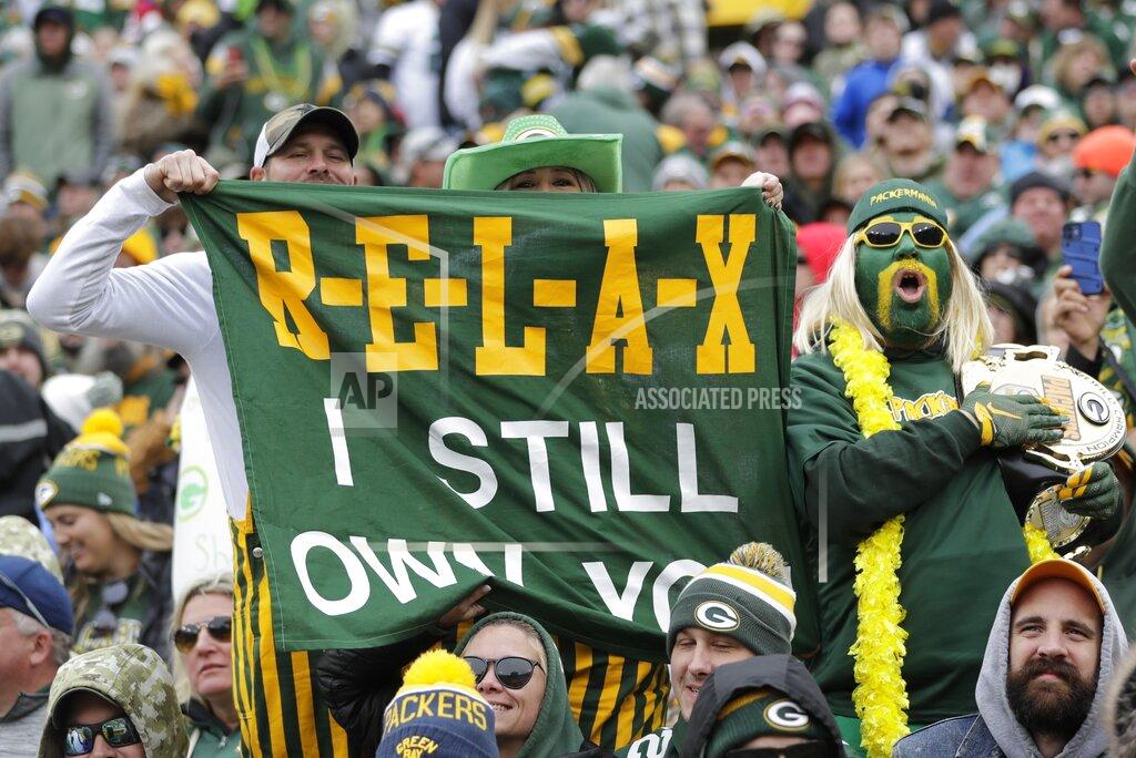 Aaron Gash Fans cheers during the second half of an NFL football game between the Green Bay Packers and the Washington Football Team Sunday, Oct. 24, 2021, in Green Bay, Wis. (AP Photo/Aaron Gash)