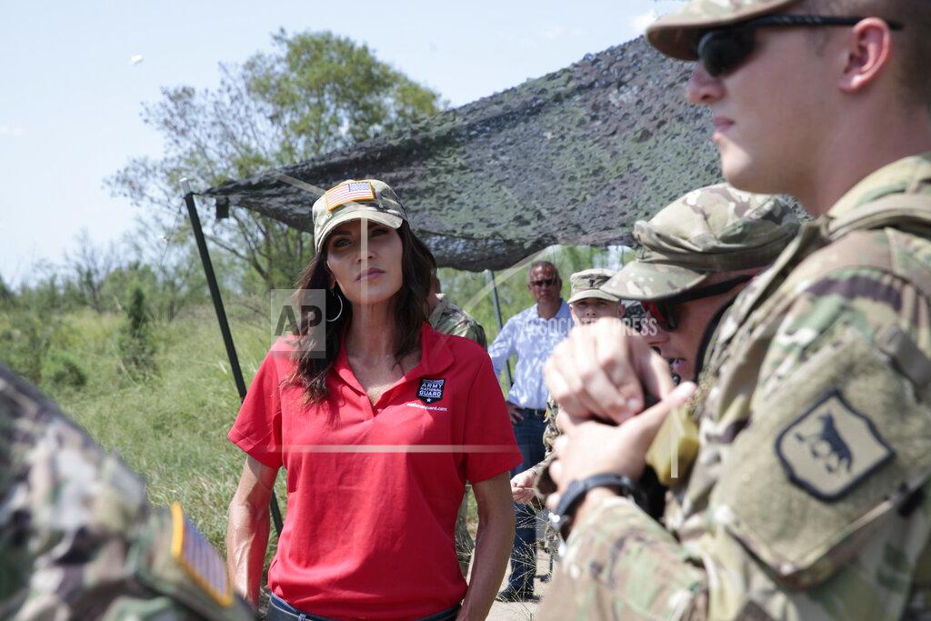 Stephen Groves South Dakota Gov. Kristi Noem visits the U.S. border with Mexico on Monday, July 26, 2021, near McAllen, Texas. The Republican governor deployed roughly 50 National Guard troops to help with Texas’ push to arrest people crossing illegally and charge them with state crimes. (AP Photo/Stephen Groves)
