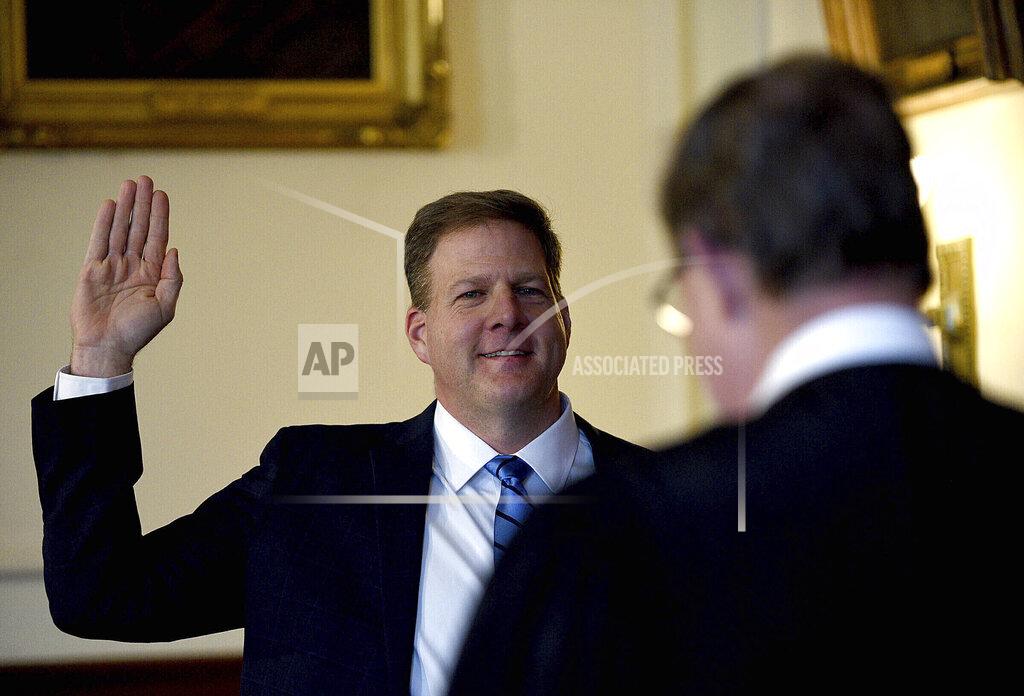 David Lane FILE - In this Thursday, Jan. 7, 2021 file photo, Gov. Chris Sununu is sworn in for his third term by Associate Justice Gary Hicks during his inauguration ceremony in the Executive Council Chamber at the State House in Concord, N.H. A measure that recently passed New Hampshire's Republican-led House would prohibit governors from indefinitely renewing emergency declarations, as Sununu has done every 21 days for the past year. It would halt emergency orders after 30 days unless renewed by lawmakers. (David Lane/The Union Leader via AP, Pool)