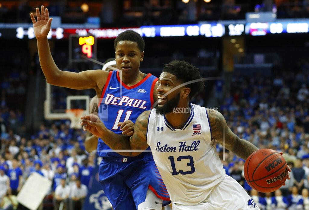 Noah K. Murray Seton Hall's Myles Powell (13) drives to the basket against DePaul's Charlie Moore (11) during the second half of an NCAA college basketball game Wednesday, Jan. 29, 2020, in Newark, N.J. (AP Photo/Noah K. Murray)